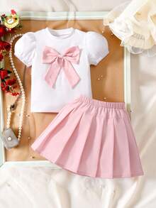 Elladie kids 2 pièces/Set Jeunes filles Top à manches courtes en tricot ivoire avec volants et nœud, et jupe plissée rouge avec perles. Tenue décontractée pour la Saint-Valentin, vêtements de printemps pour filles d'école. Tenues habillées pour filles. Vêtements pour filles. - Rose bonbon - Voir 3
