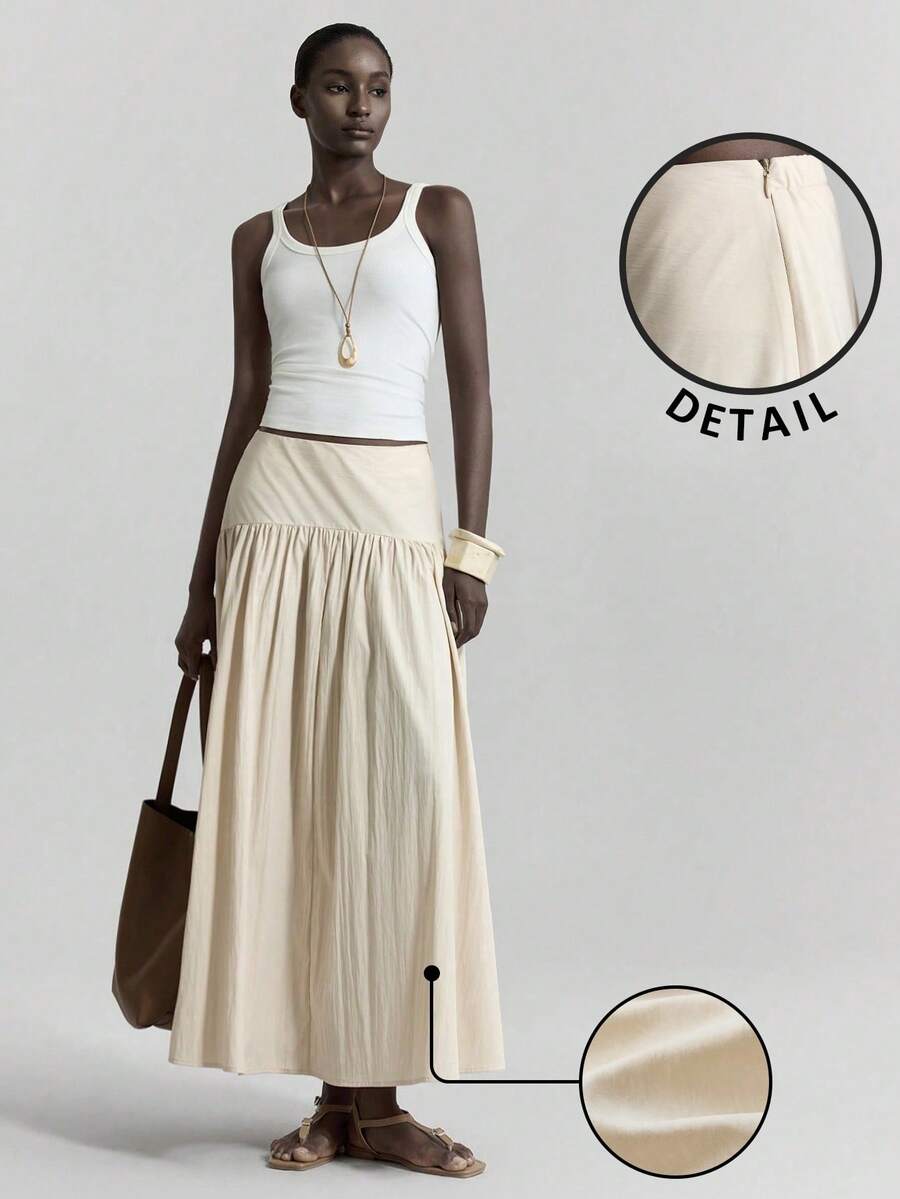 Ontre Chân váy xếp ly chữ A màu trơn phong cách đô thị 2026SS dành cho nữ, nhẹ nhàng, thanh lịch, kiểu dáng nghỉ dưỡng, eo chun, xếp ly dài, thích hợp cho tiệc trà, tiệc nghỉ mát, trang phục ngày lễ, chân váy thời trang đa năng dành cho nữ dự tiệc, đi nghỉ mát.