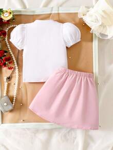 Elladie kids 2 pièces/Set Jeunes filles Top à manches courtes en tricot ivoire avec volants et nœud, et jupe plissée rouge avec perles. Tenue décontractée pour la Saint-Valentin, vêtements de printemps pour filles d'école. Tenues habillées pour filles. Vêtements pour filles. - Rose bonbon - Voir 2
