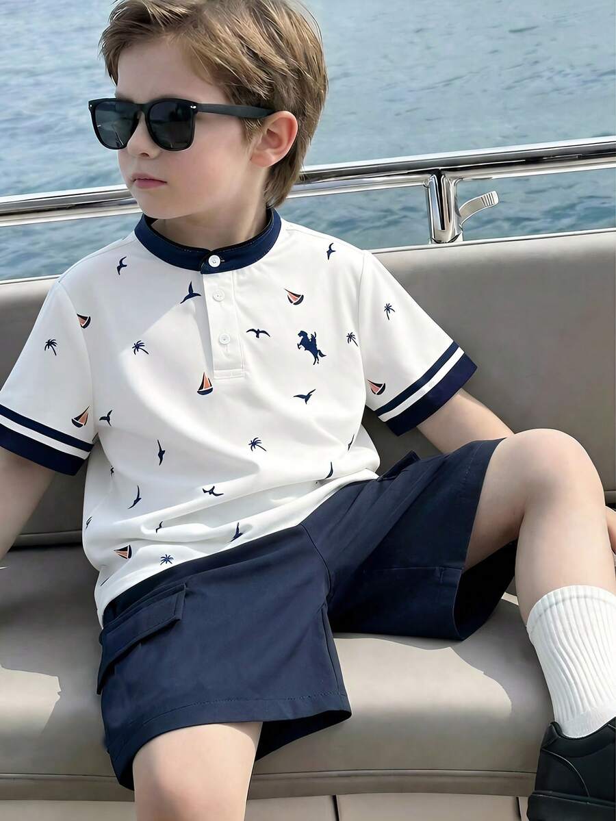 SHEIN 男童两件套：白色翻领海岛印花短袖Polo衫和藏蓝色短裤，休闲舒适，百搭，适合日常穿着、旅行、户外活动、度假、海滩度假、春夏穿着。