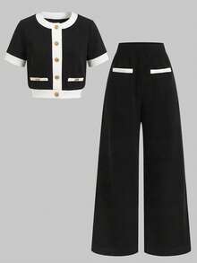 SHEIN Bộ đồ thể thao cho nữ tuổi teen, kiểu dáng thường ngày nhưng vẫn thanh lịch, thích hợp đi học. Áo và quần ống đứng phối màu đen trắng tương phản, gồm áo và quần ống đứng. - Đen và trắng - Xem 8
