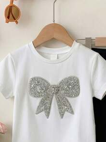 SHEIN 2件套男女通用0-3岁休闲宽松蝴蝶结装饰圆领短袖T恤和喇叭裤套装，舒适的夏季服装，秋季可叠穿，时尚女婴休闲装，可爱印花 - 彩色 - 查看 3