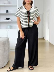 Zelara Conjunto de 2 piezas de talla grande para mujer con top de manga corta con cuello en V a rayas y atar al frente, y pantalones de pierna ancha, ropa de verano casual para vacaciones, atuendo de verano para mujer, atuendo casual para mujer, atuendos de verano para mujer, ootd, atuendo de verano para mujer, coordinado de atuendos casuales para mujer, conjuntos de atuendos para mujer, atuendos de verano para mujer, atuendos de primavera para mujer, atuendos para trabajar desde casa, atuendos casuales de verano para el Día de la Madre, Pinterest - Blanco y Negro - Ver 6