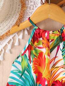 SHEIN Đầm cổ yếm dệt họa tiết hoa nhiệt đới thời trang thường ngày cho bé gái đi nghỉ mát, đầm cổ yếm dáng rộng in họa tiết cây nhiệt đới, trang phục ton sur ton cho mẹ và bé. - Nhiều màu - Xem 7