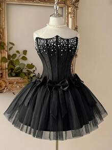 Lovelzi Đầm dạ hội thanh lịch, lãng mạn với chất liệu ren và lưới, kiểu dáng phồng, không dây vai, có gọng định hình, nơ buộc lưng có thể tháo rời, dây đeo điều chỉnh được, thích hợp cho đi biển, nghỉ lễ, dự tiệc sinh nhật, tốt nghiệp, dạ hội, đám cưới, cocktail dành cho nữ. - màu đen - Xem 1