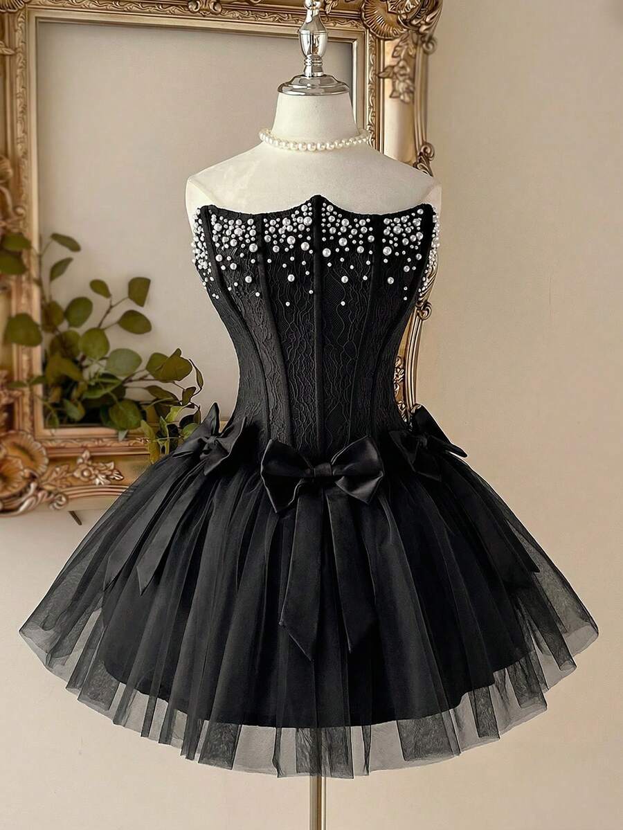 Lovelzi Đầm dạ hội thanh lịch, lãng mạn với chất liệu ren và lưới, kiểu dáng phồng, không dây vai, có gọng định hình, nơ buộc lưng có thể tháo rời, dây đeo điều chỉnh được, thích hợp cho đi biển, nghỉ lễ, dự tiệc sinh nhật, tốt nghiệp, dạ hội, đám cưới, cocktail dành cho nữ. - màu đen - Xem 1