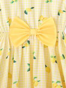Đầm chữ A tay ngắn thắt nơ họa tiết kẻ caro chanh ngọt ngào cho bé gái, thích hợp cho các buổi đi chơi mùa hè. - Nhiều màu - Xem 3