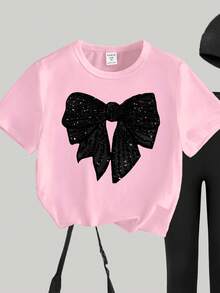 SHEIN Sparklyn Bộ đồ thể thao mùa xuân hè cho bé gái, phong cách thường ngày sáng tạo, cá tính, tối giản, điểm nhấn là nơ đen bóng, in họa tiết đồ họa, gồm áo thun và quần legging, thoải mái để mặc hàng ngày. - Nhiều màu - Xem 4
