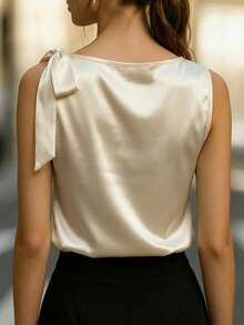 Ellegaria. Áo kiểu nữ không tay bằng vải satin bóng, cổ nơ, kiểu dáng thanh lịch, thích hợp cho đi làm, dự tiệc, mặc hàng ngày và hẹn hò. - Màu be - Xem 2