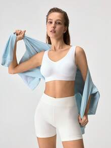 Loungeista Sujetador deportivo inalámbrico sin costuras, sujetador de yoga cómodo con almohadillas extraíbles - Blanco - Ver 8