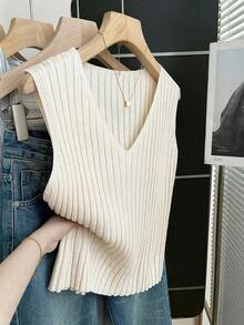 Franclia Áo khoác cardigan dệt kim gân sọc đơn giản kiểu Hàn Quốc màu kem, dáng rộng thoải mái, không tay, thiết kế cổ chữ V thanh lịch, đa năng cho cả ngày lẫn đêm, phong cách Pháp thư giãn, vẻ đẹp tối giản, áo len nữ hiện đại, áo vest dệt kim nữ, áo len trắng nữ, áo len nữ, áo vest nữ, áo khoác mùa đông, áo len nữ, áo len không tay, áo vest gân sọc, áo len chui đầu cho nữ, áo không tay. - Màu be - Xem 7