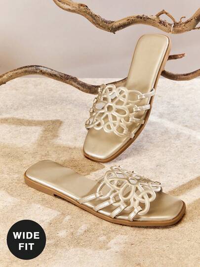 SHUZIA Sandalias de mujer de diseño artístico con puntera cuadrada, de cuero vegano dorado con diseño hueco - elegantes, minimalistas y con estilo effortless para cualquier ocasión.