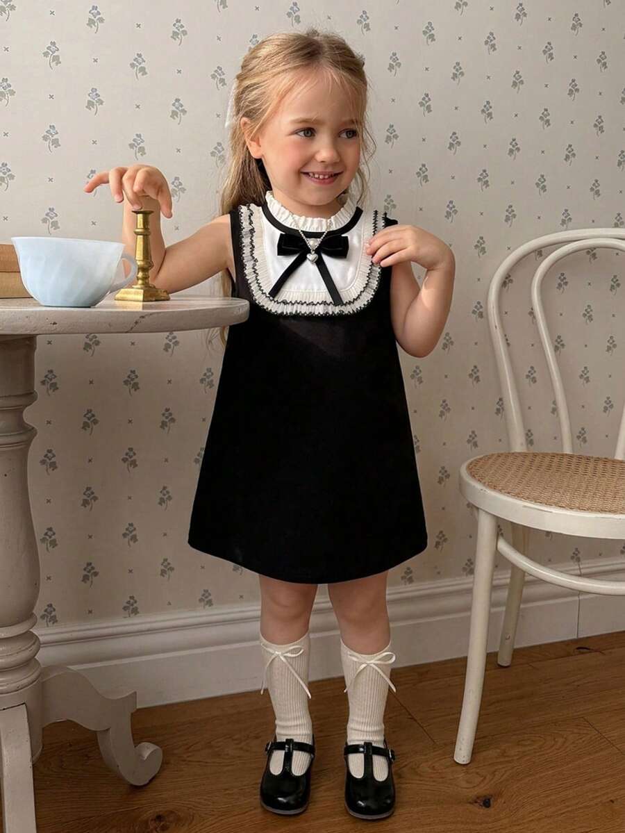 Dazy Kids فستان أطفال / رُضّع بناتي بياقة دائرية وتصميم ألوان متباينة على الطراز الكوري مع فيونكة وأكمام بلا أكمام متوسط الطول - الأسود - مشاهدة 1