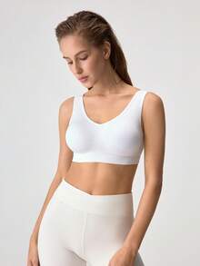 Loungeista Sujetador deportivo inalámbrico sin costuras, sujetador de yoga cómodo con almohadillas extraíbles - Blanco - Ver 6