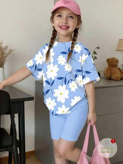 4-7岁女童白色碎花+蓝色舒适春夏新款套装，女童蓝色碎花短袖T恤+紧身短裤运动两件套，适合夏季、海滩、度假、派对等场合。