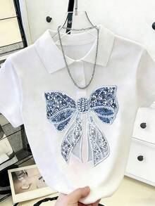Áo thun nữ tay ngắn cổ tròn, dáng casual, in hình nơ và đính ngọc trai. - Nhiều màu - Xem 5