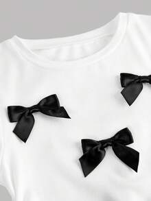 两件套女童黑白撞色蝴蝶结针织T恤和荷叶边半裙休闲套装，时尚日常穿着，适合外出、露营、拍照等场合 - 黑與白 - 查看 11