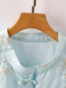 GlowEve CURVE Plus Size Embroidered Tassel Decor Button Cuff Chiffon Embroidered Fabric Elegant Short Sleeve Blouse - Baby Blue - View 6
