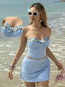 MainGRL Áo croptop corset không dây màu xanh nhạt ngọt ngào với họa tiết hoa thêu, thích hợp cho kỳ nghỉ lễ Phục sinh, đi biển, thời trang nữ, thêu hoa và trang trí nơ, kiểu dáng ôm sát, đa năng cho hẹn hò và đi chơi, bộ sưu tập Xuân/Hè 2026. - Màu xanh lam - Xem 1
