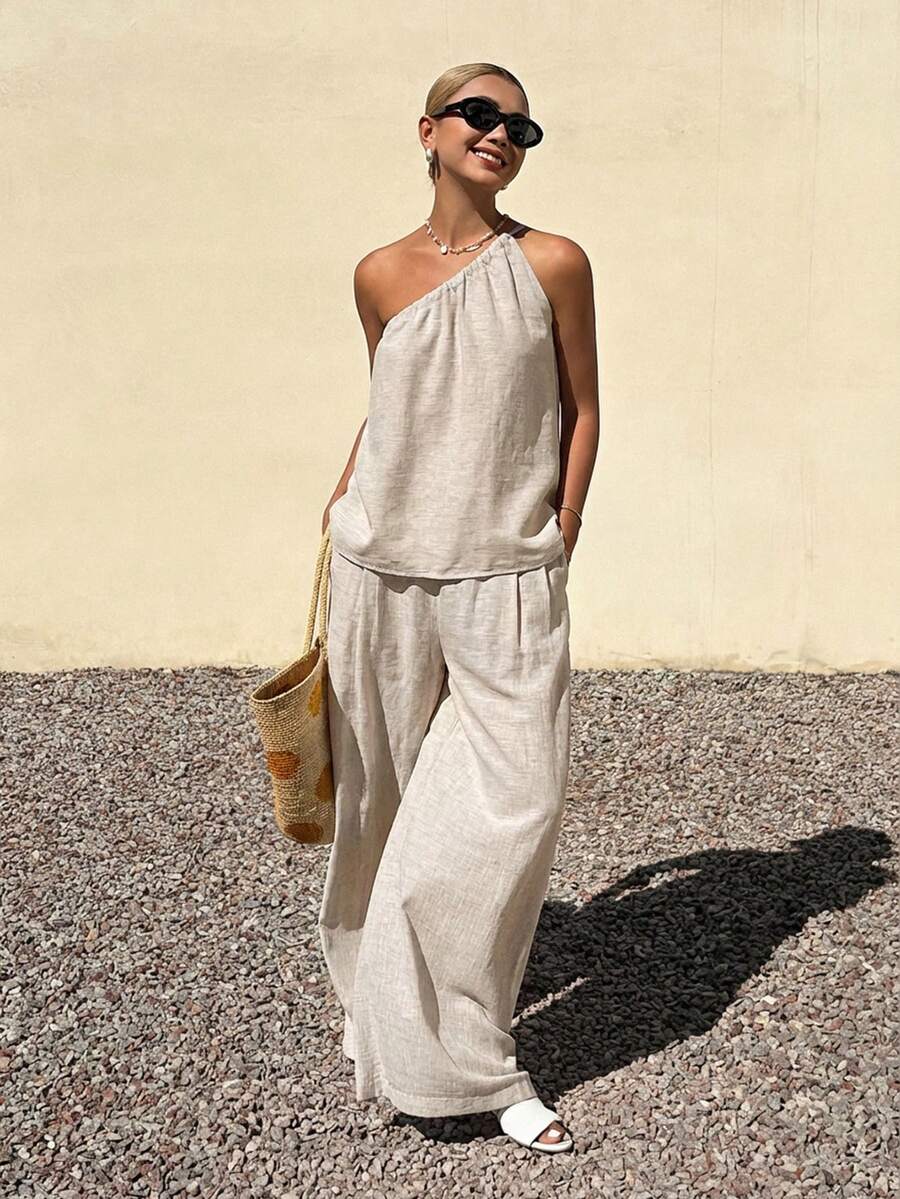 Livesso Bộ đồ thời trang xuân hè gồm áo crop top cổ lệch màu mơ và quần ống rộng suông, thích hợp cho công sở, đi nghỉ mát hoặc đi làm, thanh lịch dành cho nữ. - Màu be - Xem 1