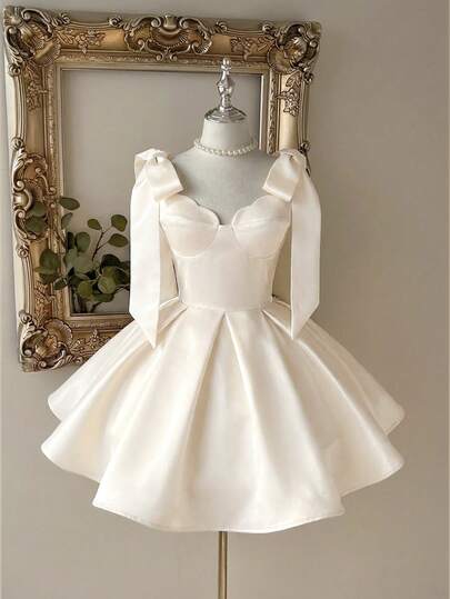 Lovelzi Elegante y lujoso vestido corto de cóctel de línea A con pliegues, tirantes de espagueti, decoración de lazo de seda con lentejuelas en color caqui