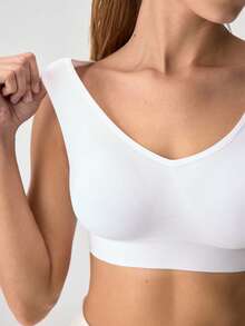 Loungeista Sujetador deportivo inalámbrico sin costuras, sujetador de yoga cómodo con almohadillas extraíbles - Blanco - Ver 7