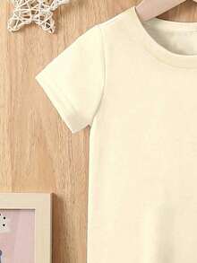 Áo thun dệt kim cổ tròn ôm sát, phong cách thường ngày, sáng tạo, dễ thương dành cho bé trai, in hình gà con và trứng Phục Sinh "I'M JUST HERE FOR THE CHICKS" (Tôi chỉ đến đây vì những chú gà con), thích hợp cho trang phục mùa xuân đến hè. - Màu be - Xem 4