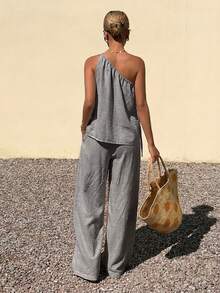 Livesso Bộ đồ thời trang xuân hè gồm áo ngắn tay lệch vai màu xám và quần ống rộng dáng suông, thích hợp cho công sở, đi nghỉ mát hoặc đi làm, với trang phục thanh lịch dành cho nữ. - Xám - Xem 2