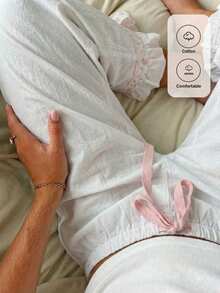 CovetEZ 休闲简约象牙色花卉撞色蝴蝶结装饰花卉灯笼荷叶边下摆女裤 - 白色 - 查看 8