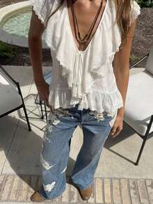Blusa sin mangas de encaje blanco estilo bohemio, camisa con cuello en V, cordón, volantes en el bajo y flecos, diseño holgado y relajado que favorece la figura - Blanco - Ver 8