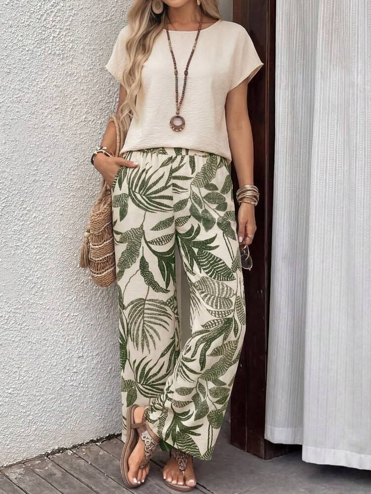 Women's Solid Color Textured Short Sleeve T-Shirt And Tropical Plant Print Pocket Long Pants 2-Piece Beach Set Summer Outfits For Women Casual Sets For Women Vacation Outfits Women Holiday Outfits For Women Summer Holiday Outfits Two Piece Set Women Summer Two Piece Set 2 Piece Vacation Outfit Two Piece Vacation Set 2-Piece Going Out Sets For Women Matching Sets For Women Women's Blouse Set