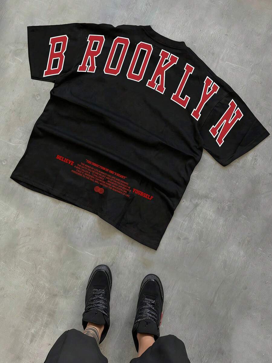 Manfinity EMRG Camiseta de manga corta con estampado de letra de hip hop de Boston para hombres - Negro - Ver 1