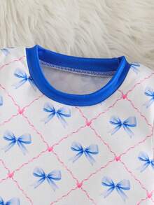 Bộ đồ ngủ ngắn tay và quần đùi ôm sát in hình nơ dễ thương cho bé gái (2 món) - trắng - Xem 6