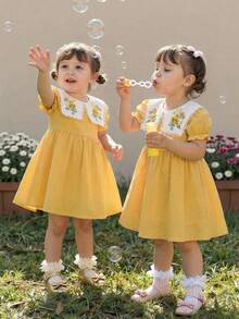 Elladie kids 2026新款女童夏季柔软舒适面料时尚连衣裙，度假旅行必备，舒适休闲质感面料，翻领花卉刺绣A字百搭短袖连衣裙，适合春夏日常穿着、居家、外出、旅行、上学等场合。 - 黃色 - 查看 1