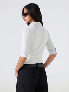 LYSMO Chiếc áo thun nữ dáng ôm thời trang tối giản mùa xuân 2026 với tay raglan phối màu, cổ bẻ nửa mở này phù hợp cho việc đi làm, Giáng sinh, Năm mới, Lễ Tạ ơn, Lễ tốt nghiệp và các dịp khác. Nó thanh lịch, đa năng và hoàn hảo cho trang phục thường ngày ở nhà. Thiết kế cổ chữ V sâu, màu trắng và sự thoải mái thường ngày khiến nó trở thành một lựa chọn tuyệt vời. - trắng - Xem 2