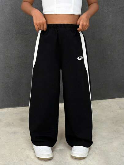 Pantalones casuales holgados con parches de colores contrastantes para niña