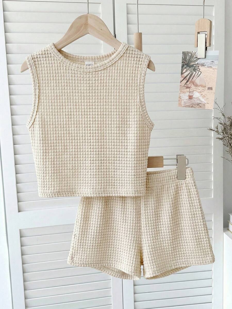 Bộ đồ cho bé gái tuổi teen: Áo tank top không tay cổ tròn kẻ sọc và quần short, kiểu dáng rộng rãi, tối giản, thoải mái. - Màu Khaki - Xem 1