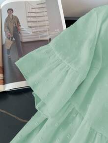 GlowEve CURVE Camisa casual de talla grande para mujer de un solo pecho con volantes en el bajo, de unicolor - verde menta - Ver 4