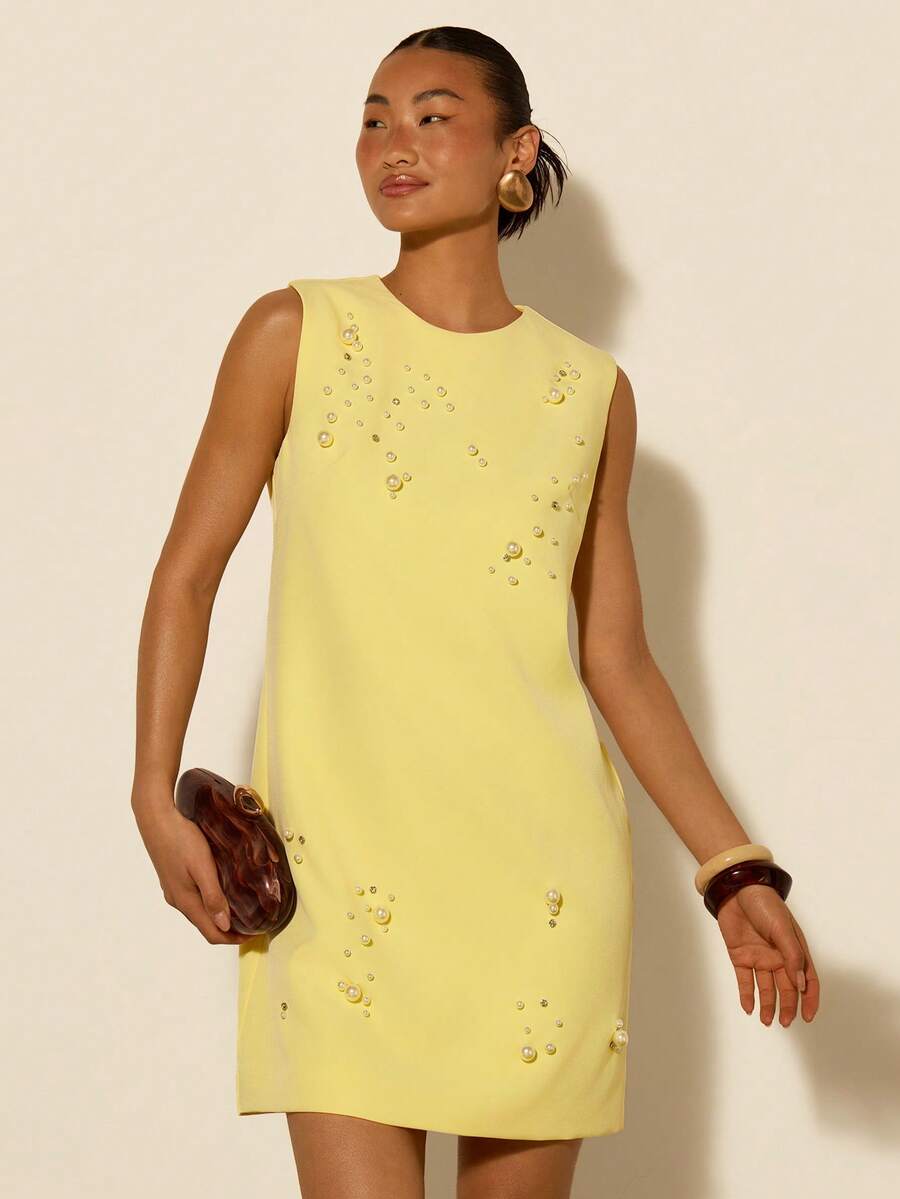 COSMINA Women's Elegant Sleeveless Round Neck Pearl Decor Versatile Mini Dress, Suitable For Spring/Summer Outings, Dates, Commuting, Office, Spring - Light Yellow - View 1