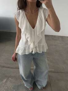 Blusa sin mangas de encaje blanco estilo bohemio, camisa con cuello en V, cordón, volantes en el bajo y flecos, diseño holgado y relajado que favorece la figura - Blanco - Ver 7
