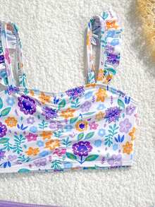 Souflis Souflis 女童碎花比基尼套装，高弹柔软面料，吊带背心式泳衣搭配网纱裙摆，鲜艳的碎花图案，柔软亲肤，适合女童穿着。碎花两件套，女童夏季两件套比基尼，女童两件套泳装，女童比基尼泳衣，女童泳装，女童比基尼套装，女童沙滩装，女童三件套，女童夏季套装，女童泳装，适合7-10岁女童，女童海滩度假装。 - 紫色 - 查看 3