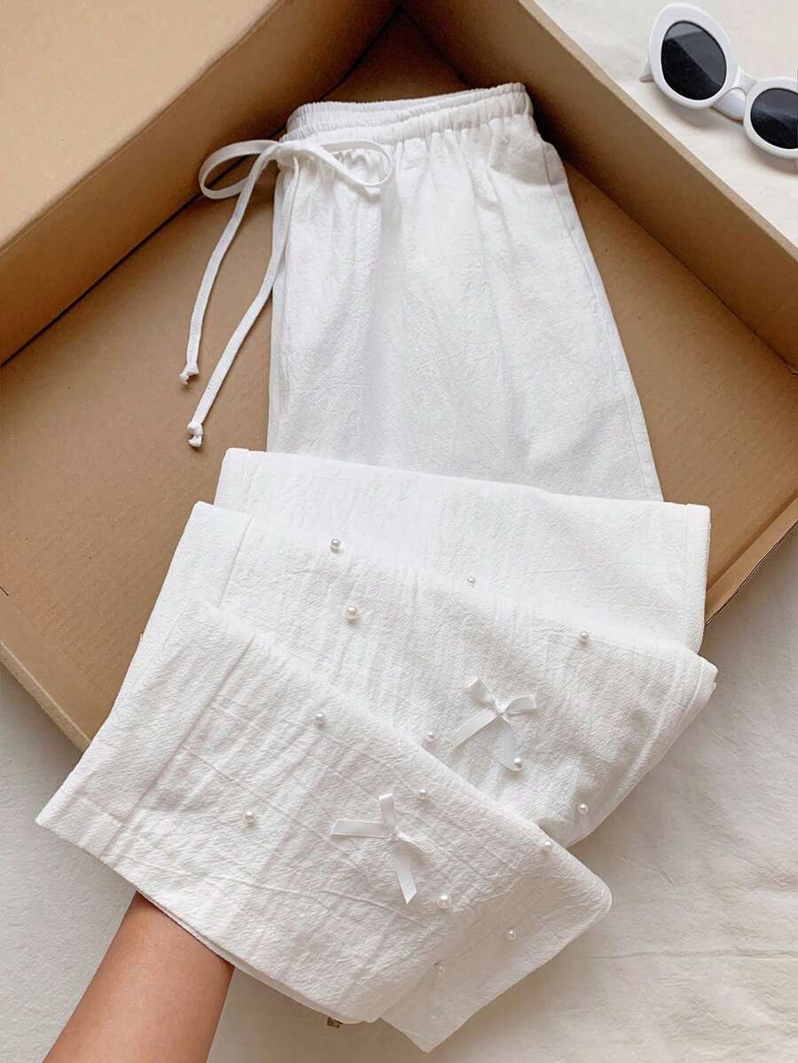Comfortcana Quần nữ kiểu dáng thường ngày, màu trơn, đính hạt và nơ. - trắng - Xem 1