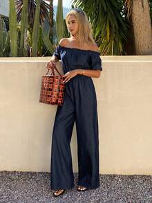 DAZY Bộ jumpsuit denim nữ màu trơn thanh lịch, chất liệu denim bạc màu, kiểu dáng trễ vai, có bèo nhún, thích hợp cho mùa xuân/hè. - Rửa trung bình - Xem 7