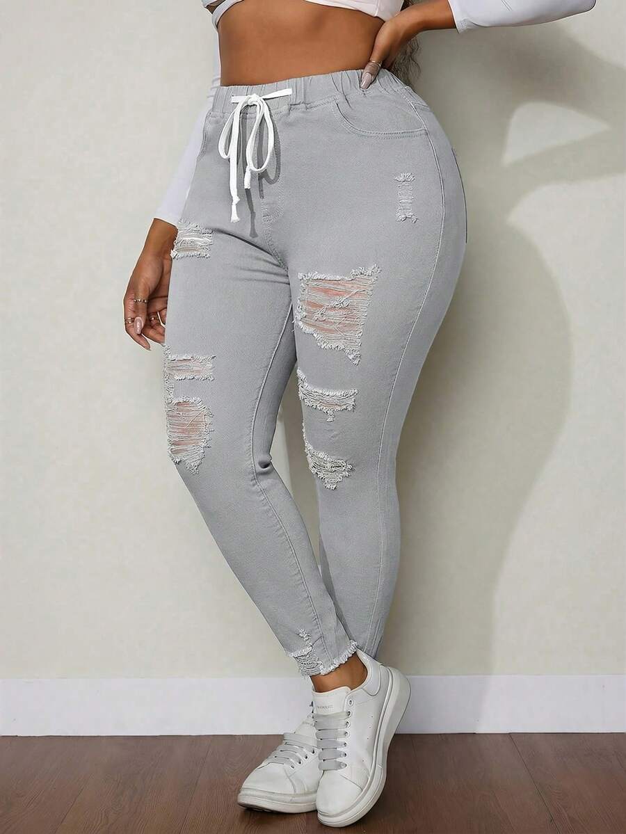 SHEIN SXY Quần jeans nữ cỡ lớn, cạp chun, kiểu rách, có dây rút, đa năng. - Màu Xám nhạt - Xem 1