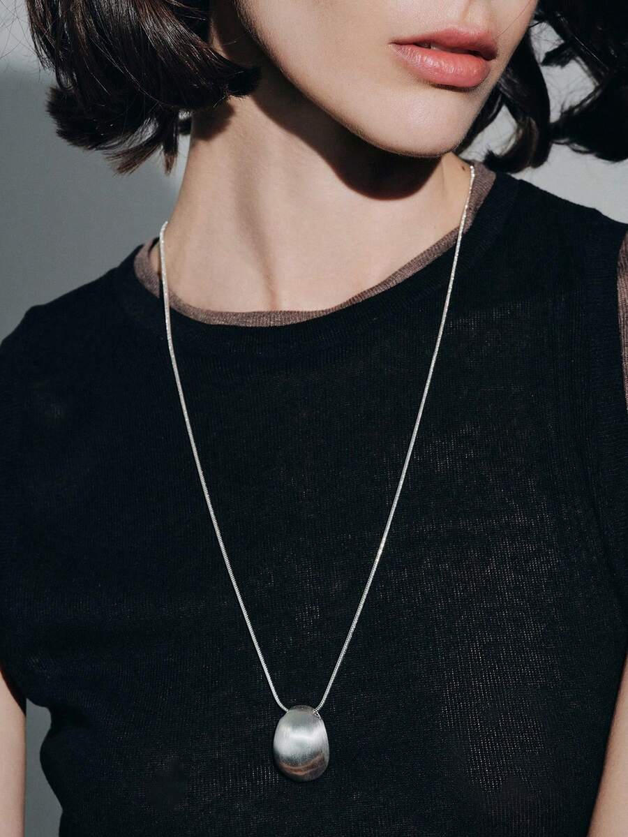 一款酷炫的银色水滴吊坠项链，专为女性设计，小众、轻奢、高端、长款，简约/复古/优雅，适合妈妈/女士/女孩/母亲佩戴，适合夏季/海滩/舞会/派对/度假/旅行，波西米亚风/现代风/时尚风，日常/工作日皆可佩戴。 - 銀色 - 查看 1