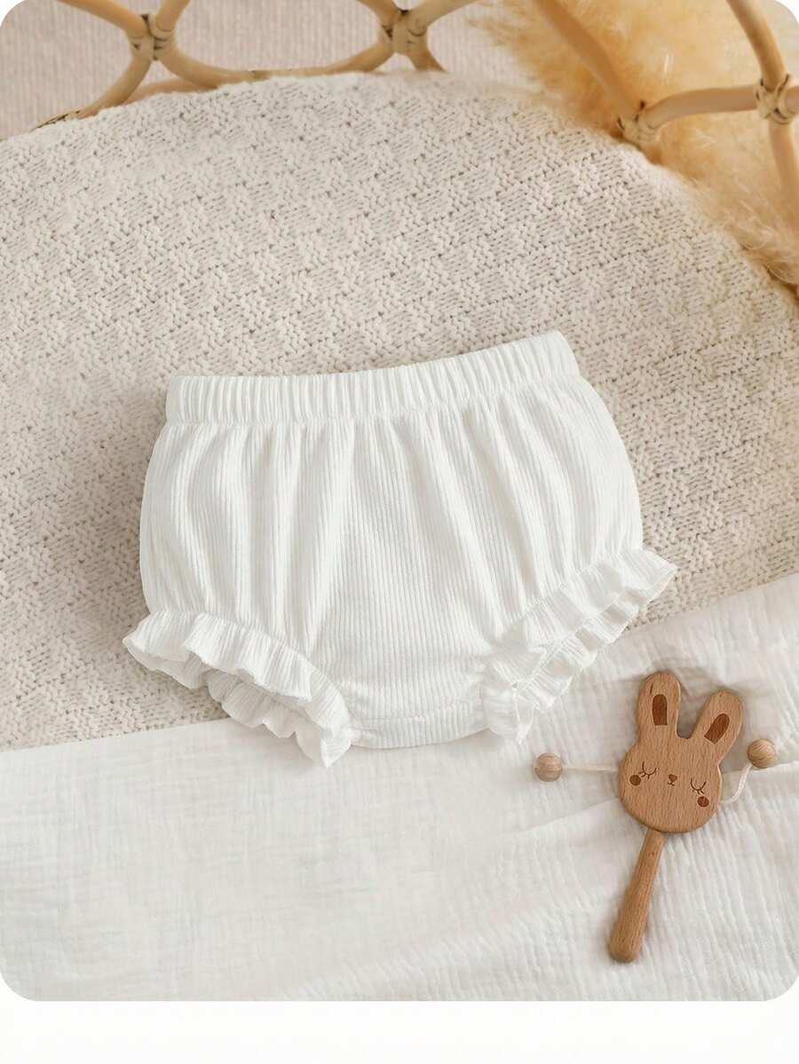 SHEIN Newborn Baby Casual Solid Color Ribbed Knit Elastic Waist Ruffle Hem Romper Shorts - White - View 1