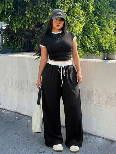 Muchica 黑白对比色 T 恤和裤子套装，大码女款