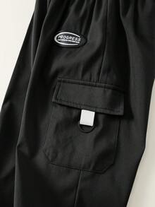 SHEIN Pantalones casuales de calle para niño con patrón de letras grises y cintura elástica - Negro - Ver 6