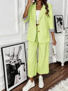SHEIN Clasi Bộ đồ nữ gồm áo khoác màu xanh neon có cổ tay áo kẻ sọc và quần dài. - Màu vàng - Xem 1