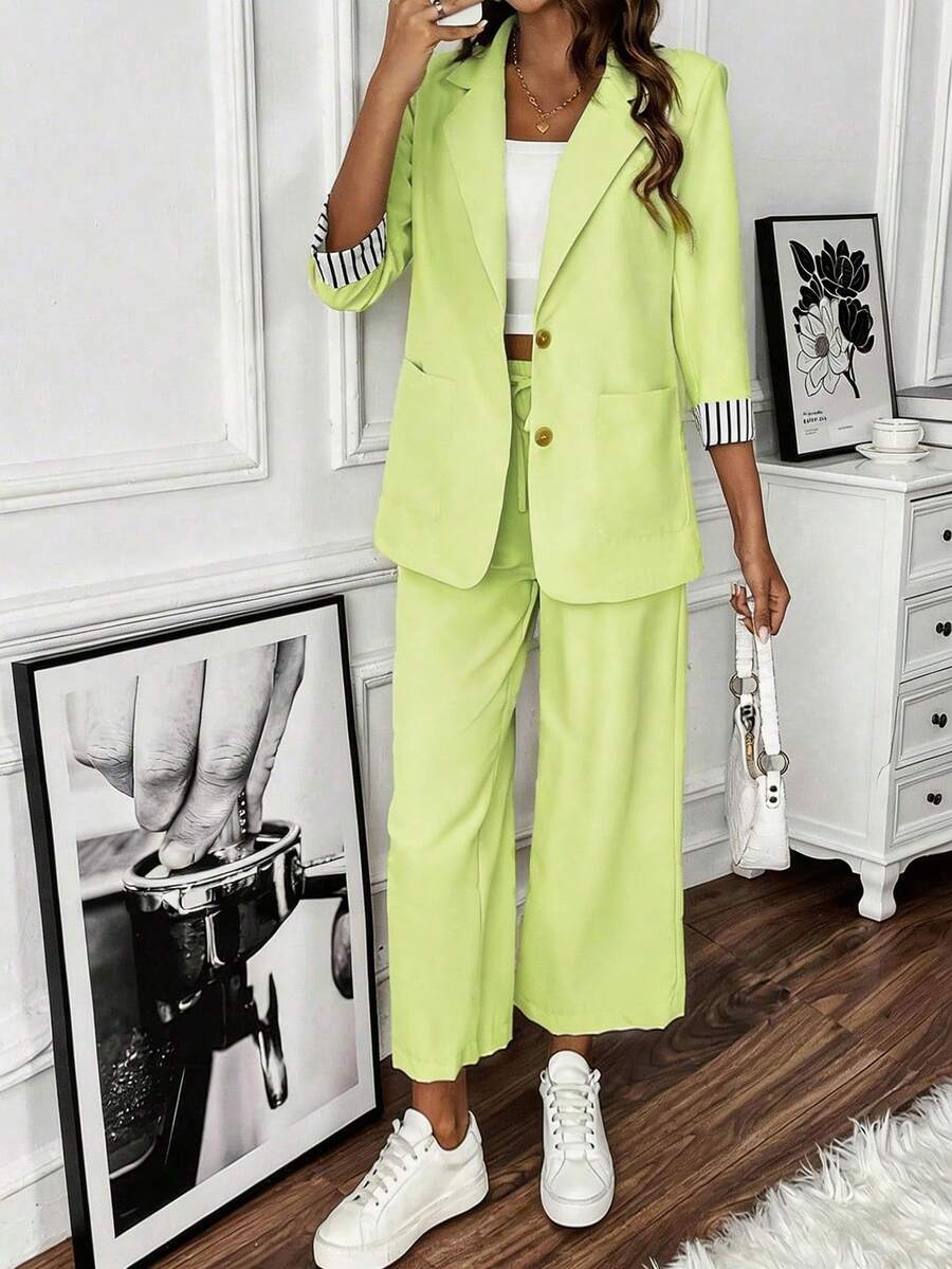 SHEIN Clasi Bộ đồ nữ gồm áo khoác màu xanh neon có cổ tay áo kẻ sọc và quần dài. - Màu vàng - Xem 1